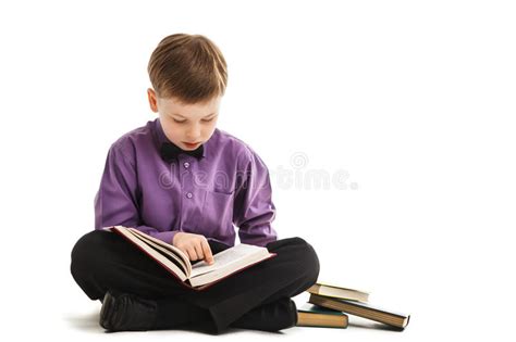 Young Boy Reads A Book Isolated Stock Photo Image Of Expression