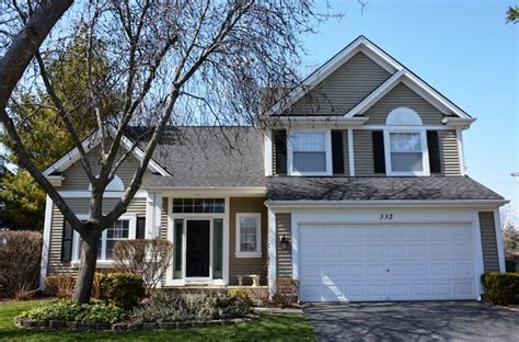 Charming Grayslake 4 Bedroom Home With Finished Basement And Cozy Sunroom