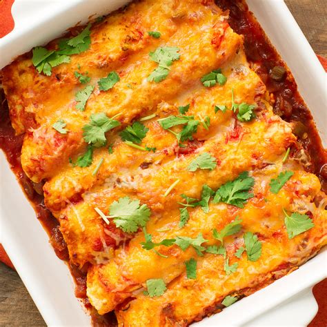 Then pour the chicken mixture that you prepared in your skillet on the tortillas and spread evenly. Chicken Enchilada Casserole - Andrew & Everett Cheese