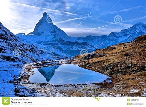 Reflection Of The Matterhorn On Riffelsee Lake Switzerland Stock Photo