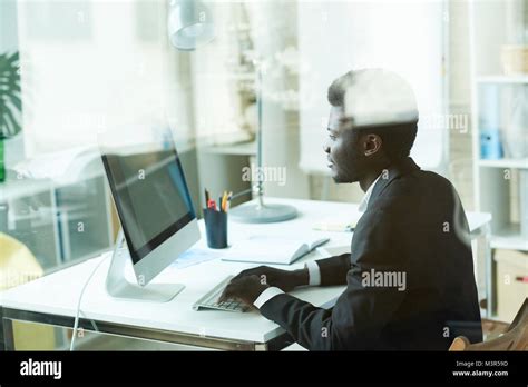 Successful African Businessman Using Pc Stock Photo Alamy