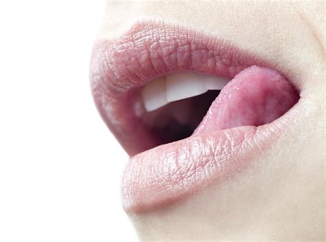 Woman Licking Her Lips Photograph By