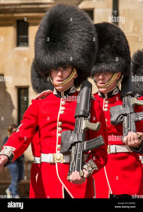 British Royal Guards With Guns In Windsor Stock Photo Alamy