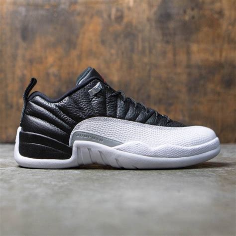 Designer kim jones' take on the iconic sneaker makes use of a white and grey upper constructed from italian leather with. Air Jordan 12 Retro Low Men (black / varsity red-white ...