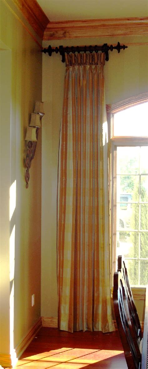Tension curtain rods install easily — no need to drill holes — and can be a great way to hang lightweight curtains in the kitchen window above your sink. Separate rods - This is how you treat an oddly shaped ...
