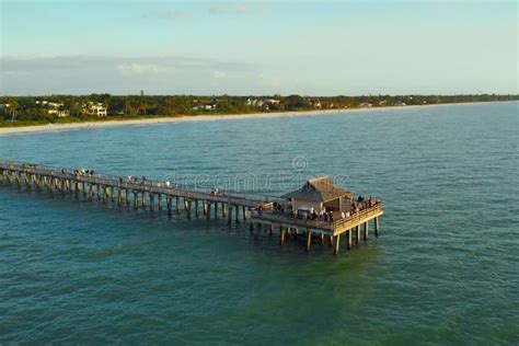 Naples Beach And Fishing Pier At Sunset Florida Stock Image Image Of