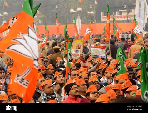 A Supporter Of The Bharatiya Janata Party Bjp Awaits The Arrival Of