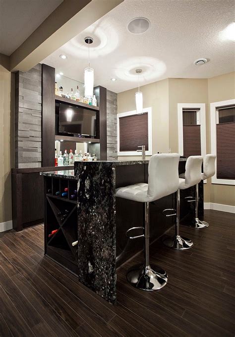 A home bar is one of the ultimate indulgences for a homeowner. 27 Basement Bars That Bring Home the Good Times!