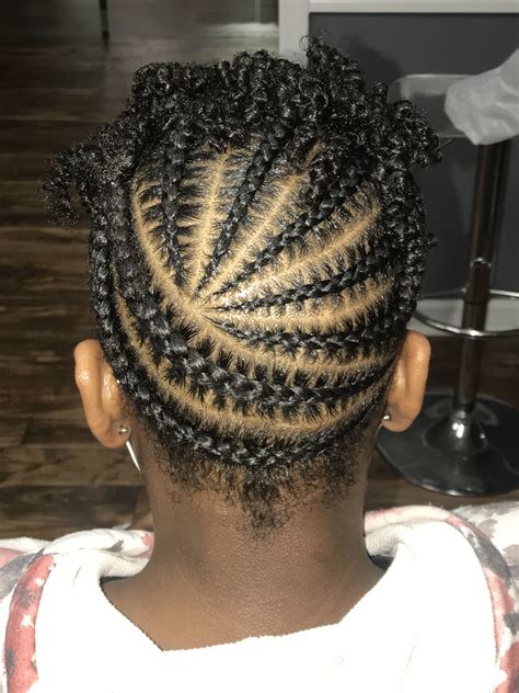 Hold the two outer strands aside, reaching under the initial braid to add a small amount of hair to the middle. Everything You Need To Know About 280 Cornrow Braid Is Here - Braids Hairstyles for Black Kids