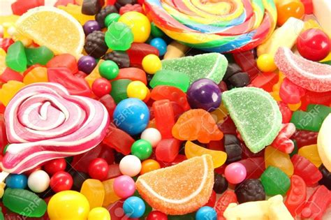 Assorted Variety Of Sweet Sugar Candies Includes Lollipops Gummy