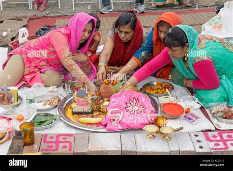 hindu women at the lakshmi hawan services at the diwali motorcade in richmond hill queens new