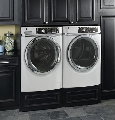 ge gewadrwg3 stacked washer and dryer set with front load washer and gas dryer in white