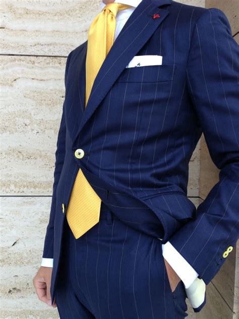 Reinvented classics and timeless essentials in wool, linen and cotton; navy and pinstripes with a splash of yellow | Blue suit ...