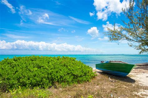 Old Fishing Boat On A Tropical Beach At The Stock Photo Image Of