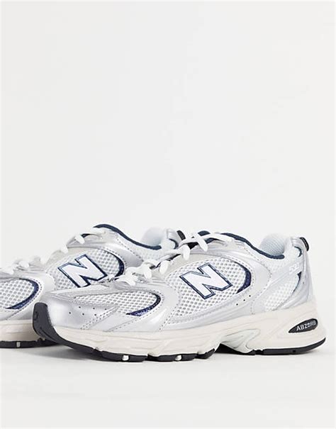 New Balance 530 Trainers In Grey And Navy Asos