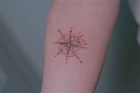 Fine Line Compass Rose Tattoo On The Inner Forearm