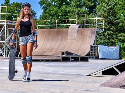 Teen Girl Holding Skateboard — Stock Photo © Poznyakov 96776326