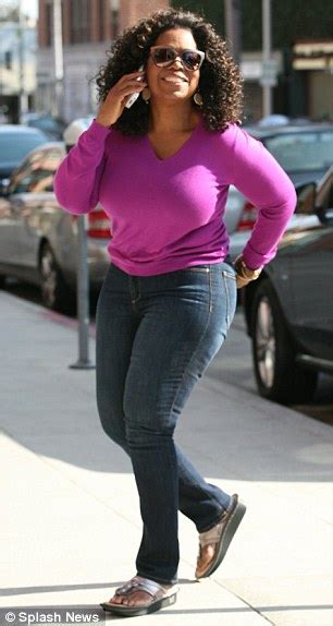 Oprah Winfrey Shows Off New Slimmer Figure In Fuchsia Jumper And Skinny