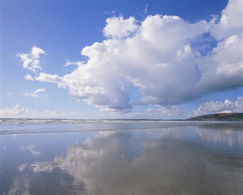 Cumulus Clouds Reflected On Water Photograph By Simon Fraserscience