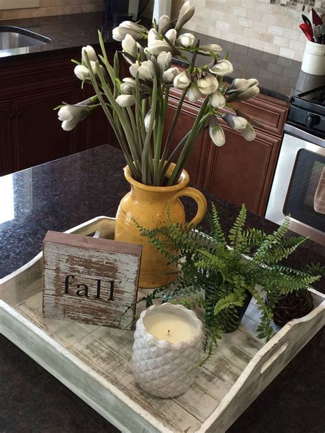Love this decor idea for a kitchen island or peninsula! Tray makes it