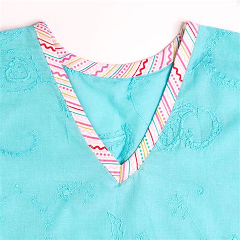 After you have made the pattern it is a breeze to sew the top. ﻿How to Sew a V Neck with Bias Tape | TREASURIE