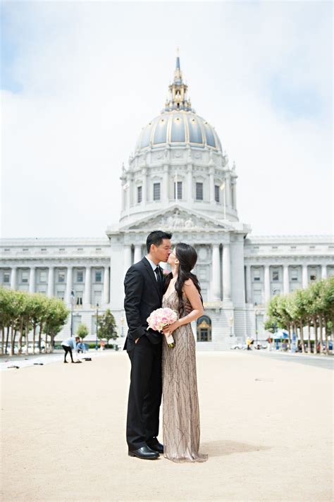 Rent a wedding dress along with an evening dress as is common. San Francisco City Hall Elopement | Courthouse wedding