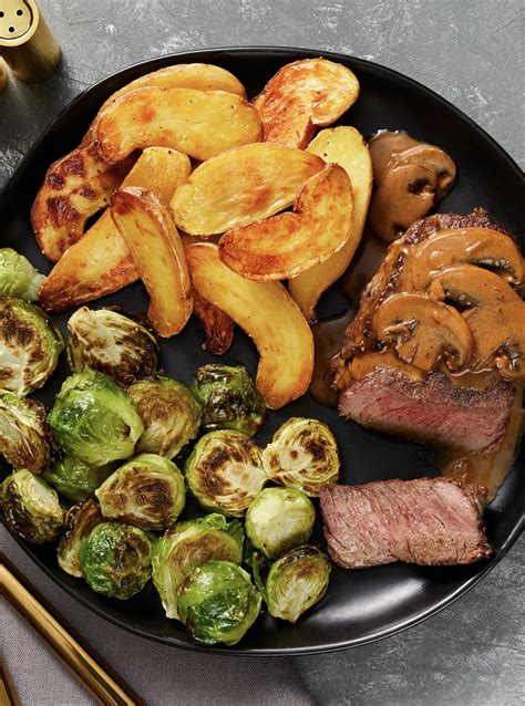 Place beef on rack set over large rimmed baking sheet. Beef Tenderloin with Mushroom Sauce with Roasted Brussels ...