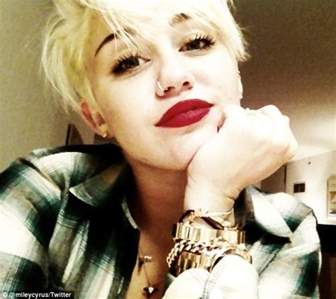 Miley Cyrus Tweets Incessantly Photos Of Herself Daily Mail Online