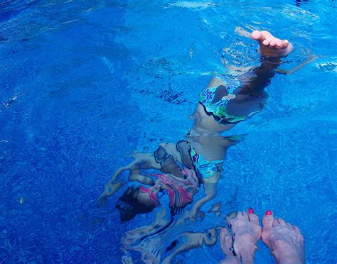 abstract lexie s body my feet her pool last summer ~~~~~~~… flickr
