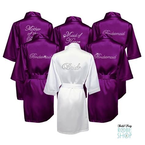 Six Robes In Purple And White With The Bride S Name Written On One Side