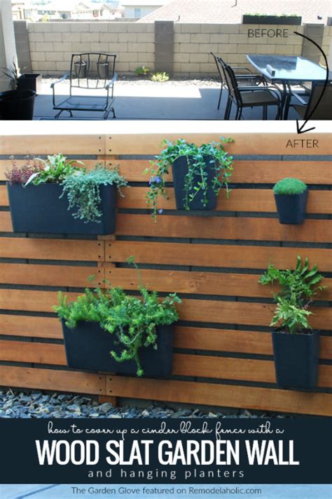 Cinder blocks are way more versatile than you think. Remodelaholic | DIY Wood Slat Garden Wall with Planters