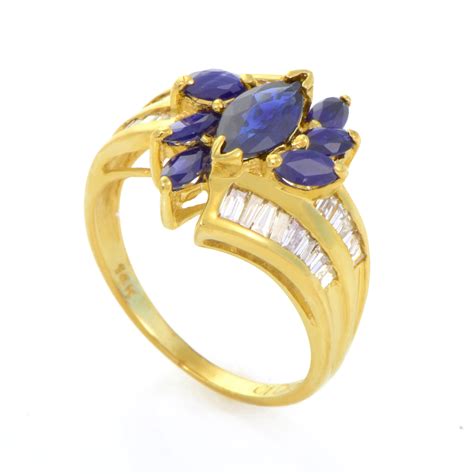I've always wanted an affordable replica of the gorgeous flower sapphire/diamond engagement ring. Rings 14K Yellow Gold Sapphire Flower & Diamond Ring | Luxury Bazaar | www.luxurybazaar.com