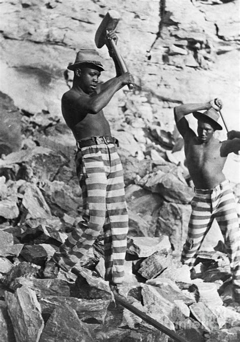 Chain Gang Worker In Striped Pants By Bettmann