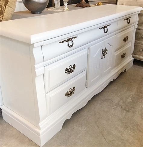 The heirloom triple dresser is a masterful piece of tradition finished in a distressed antique white with rubbed through highlights. ALL WOOD by Johnston / Tombigbee 9 Drawer Triple Dresser ...