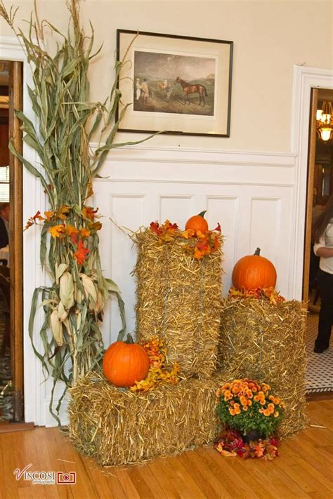 Fall Decorations Hay Bales Corn Stalks Pumpkins And Mums Fall