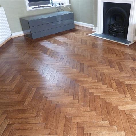 Huge savings on parquet flooring with fast delivery & 5 star trustpilot reviews. Livigna Herringbone SOLID MERBAU PARQUET Natural Flooring ...