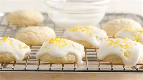50 christmas cookie recipes to try and love for the holidays! Lemon-Glazed Cream Cheese Cookies recipe from Pillsbury.com