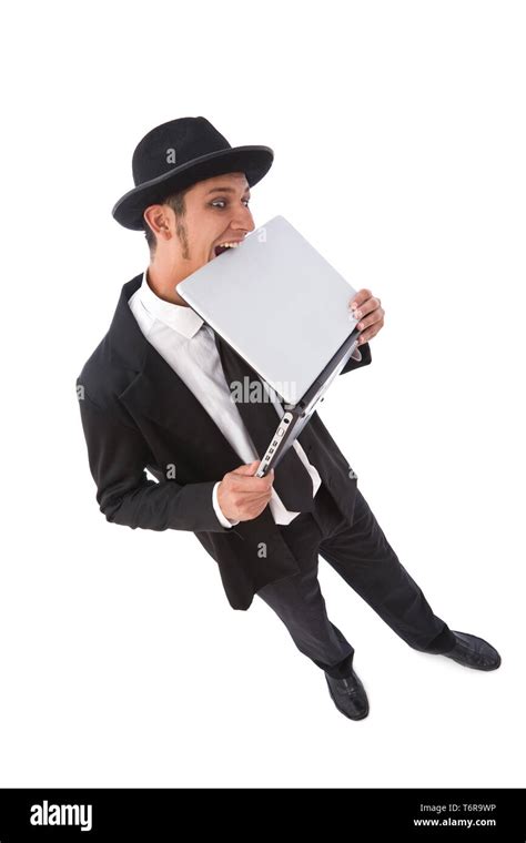 Funny Looking Computer Hacker With A Laptop On White Stock Photo Alamy