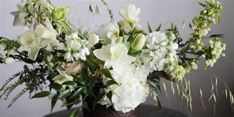 Beautiful White Flower Arrangements White Centerpiece Ideas