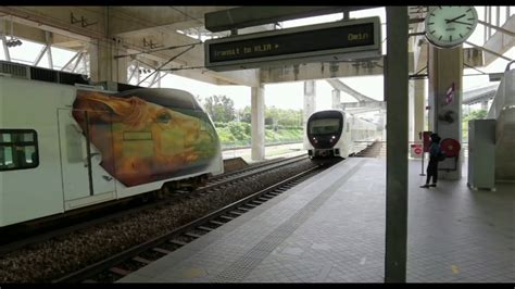 The klia transit train makes a brief arriving at putrajaya & cyberjaya station, with putrajaya sentral on the left. KLIA Transit | Putrajaya Sentral to KLIA - YouTube