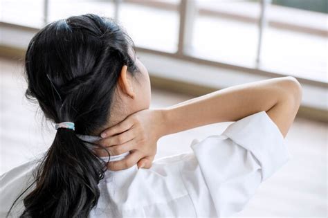 Premium Photo Closeup Woman With Neck And Shoulder Pain And Injury
