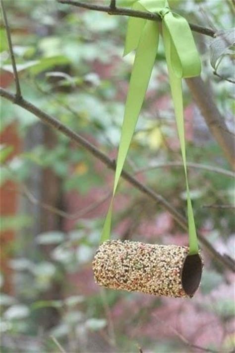 Use a light weight sandpaper to remove excess paper or glue from the roll. Extremely Easy Bird Feeder From Toilet Paper Roll · How To ...