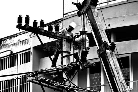 Silhouette Electrician Working On Electricity Post Stock Photo Image