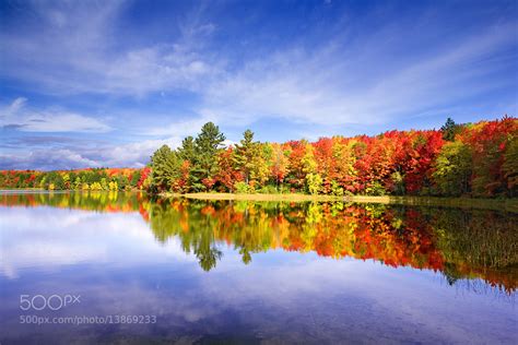photograph michigan upper peninsula lake fall colors foliage reflection by ya zhang on 500px