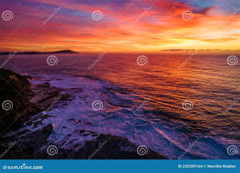 Aerial Sunrise Seascape At Rocky Inlet With Colourful High Cloud Stock