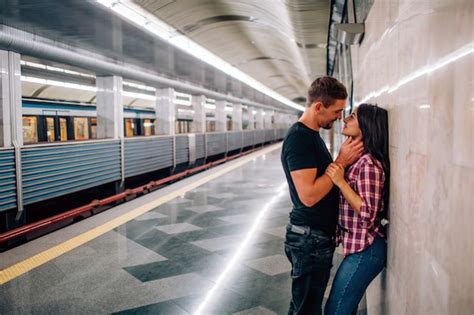 Premium Photo Young Man And Woman Use Underground Couple In Subway