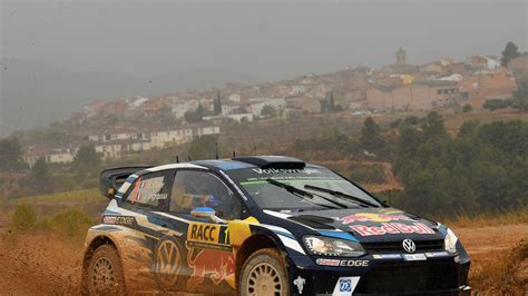 sebastien ogier retains world rally championship title by winning rally of catalonia motor