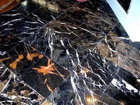 Creating a particular finish on marble (or any stone) or polishing marble to make and entire countertop or floor shiny is not a. Black Gold Marble Floor Tile from Pakistan - StoneContact.com