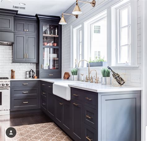 Using multiple cabinet styles works for almost every kitchen theme, from vintage to contemporary. Like the mouldings, display cabinet & different depths ...