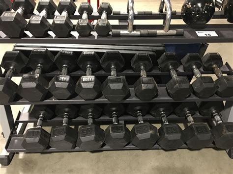 2 Racks With Matching Set Of Cap Dumbbells Ranging From 5lbs 90lbs